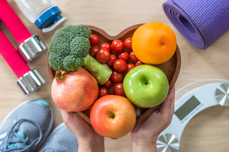 Heart bowl of fruits and veggies. Aspire offers wellness resources from heart associations to weight loss programs.